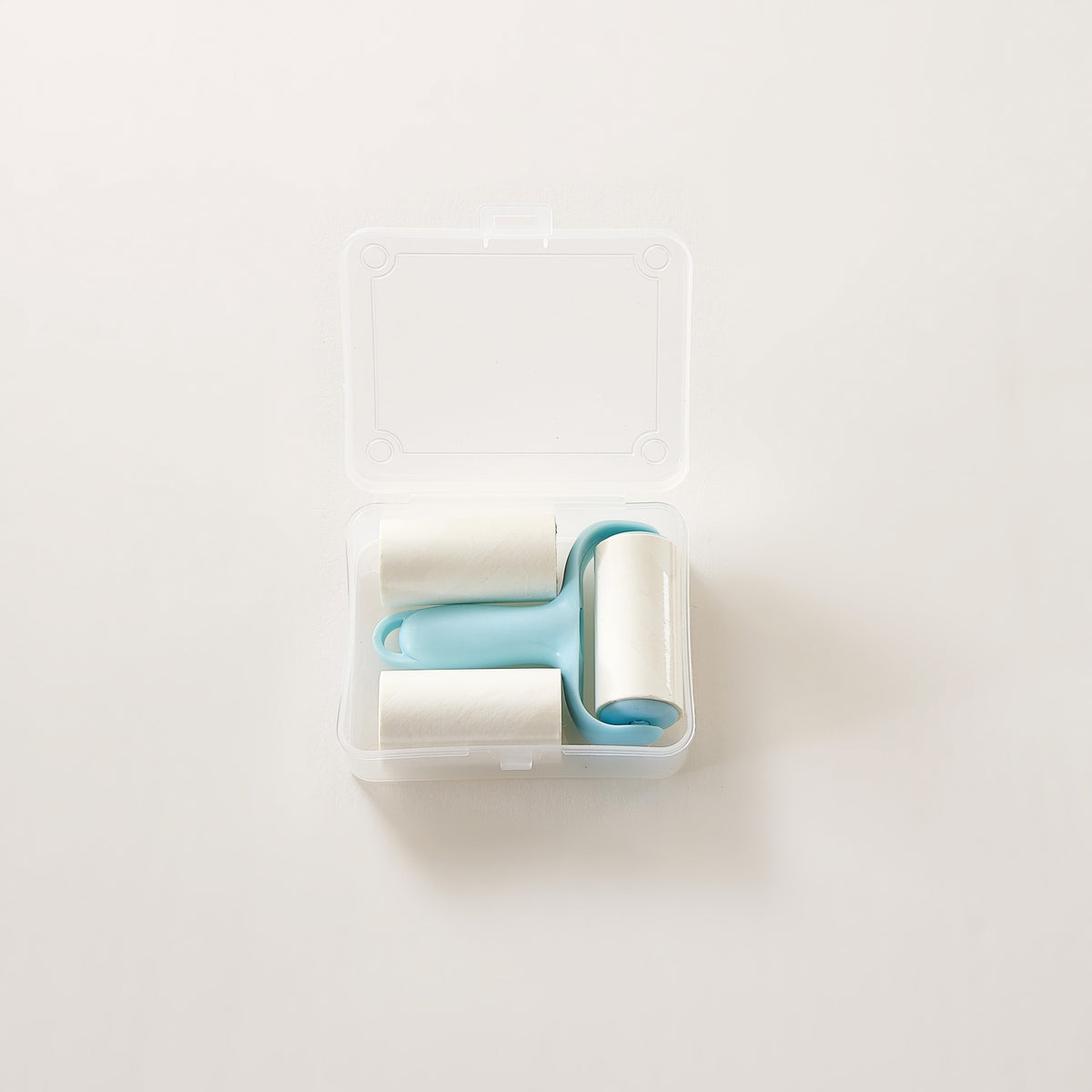 Care Kit lint roller with spare rolls in its case