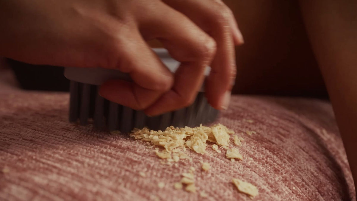 Crumbs brush right off the chenille.