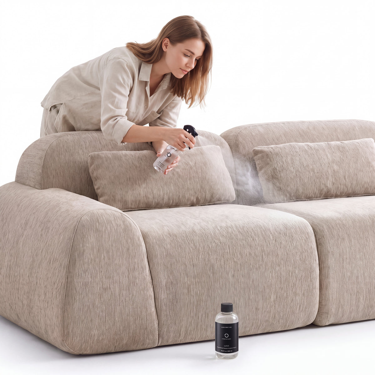 Fabric Care Spray in use on an O'Cloudy sofa